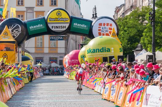 KRAKOW, POLAND - AUGUST 9: Cyclist at the final stage of 71th Tour de Pologne on August 9, 2014 in Krakow. Tour de Pologne is the biggest cycling event in Eastern Europe.