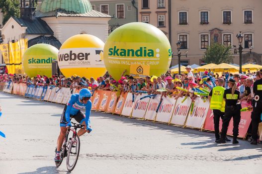 KRAKOW, POLAND - AUGUST 9: Cyclist at the final stage of 71th Tour de Pologne on August 9, 2014 in Krakow. Tour de Pologne is the biggest cycling event in Eastern Europe.