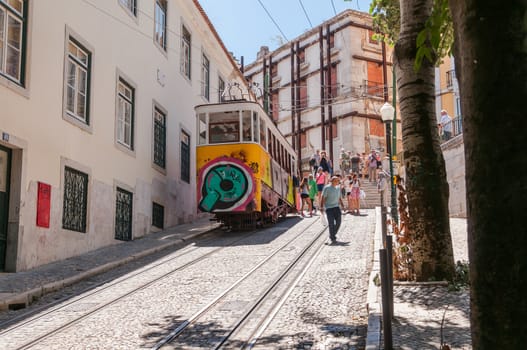 LISBON, PORTUGAL - AUGUST 23: The Gloria Funicular is a funicular that links Baixa with Bairro Alto districts in Lisbon on August 23, 2014. The Gloria Funicular was opened to the public on October 24, 1885