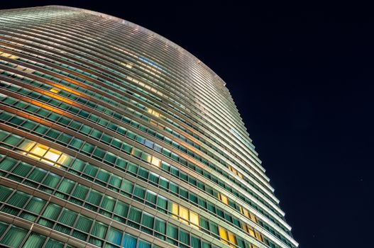 LONDON, UNITED KINGDOM - NOVEMBER 10, 2014: Closeup of Marriott West India Quay hotel building in Canary Wharf by night