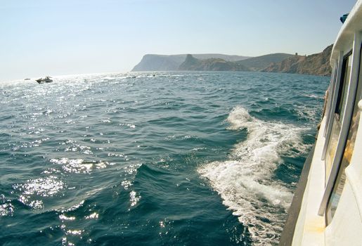 Waves on seascape in sun light at Black sea. Fish-eye lens.