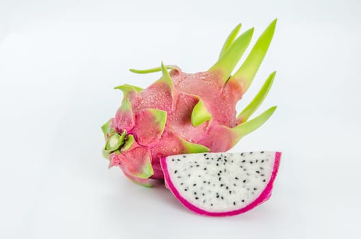 Ripe Dragon fruit or Pitaya with slice on white background