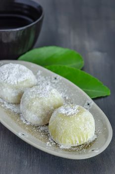 Daifuku Mochi Japanese dessert on dish with  hot tea , still life