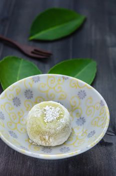 Daifuku Mochi Japanese dessert on dish over wooden background