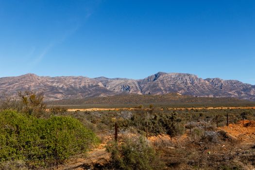 The Fence Landscape - South Africa's geography. South Africa occupies the southern tip of Africa, its long coastline stretching more than 2 500km from the desert border with Namibia on the Atlantic coast, southwards around the tip of Africa, then north to the border with subtropical Mozambique on the Indian Ocean.