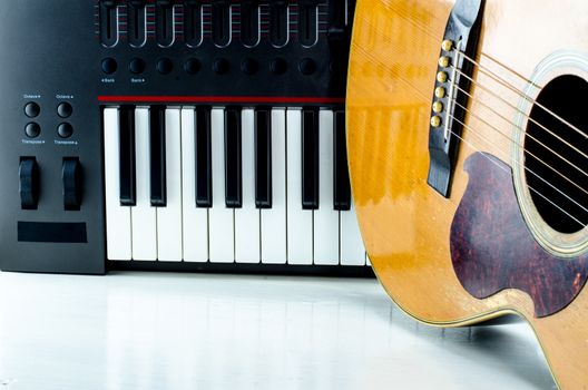 Acoustic guitar keyboard, close-up.