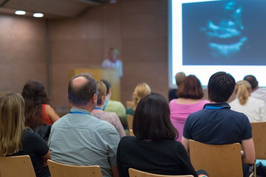 Faculty lecture and workshop. Audience at the lecture hall. Academic education.