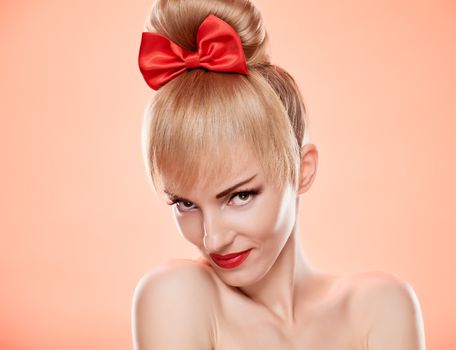Beauty fashion portrait loving woman smiling. Sensual attractive pretty nude blonde sexy girl, Pinup hairstyle, red bow. Confidence unusual emotional playful. Romantic, retro vintage, skincare on pink