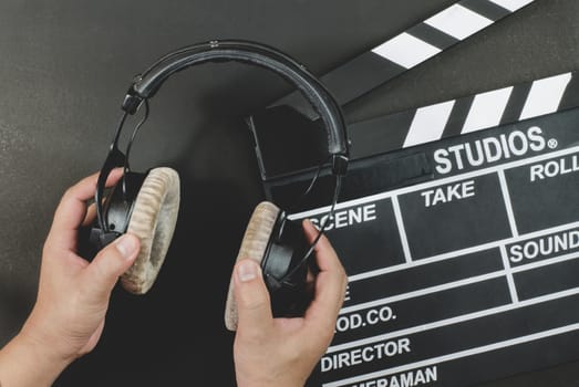 Handle headphone on a slate black background