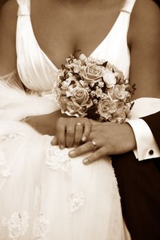 Hand of the groom and the bride with wedding rings