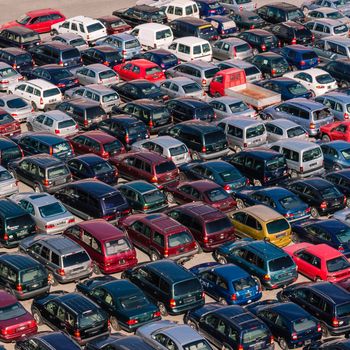 Parked cars at the busy Port of Savona, Italy.