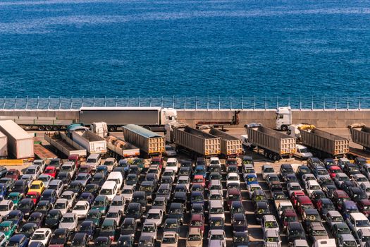 Parked cars at the busy Port of Savona, Italy.