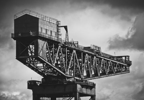 Black And White Image Of Industrial Shipbuilding Crane On The Clyde River In Glasgow