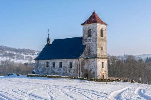 The old church in snowy landscape