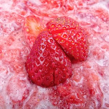 Strawberry puree, decorated with fresh strawberries