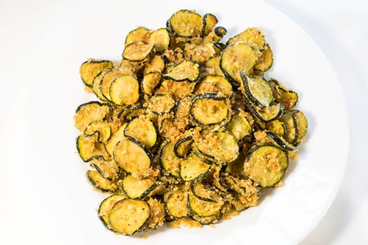 Cooked slices of crispy zucchini