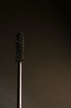 Mascara close up in a darken background