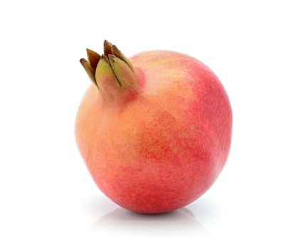 Close up of indian pomegranate on a white background