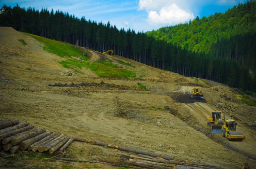 Deforestation environmental problem, forest destroyed for building resort, Bukovel, Ukraine