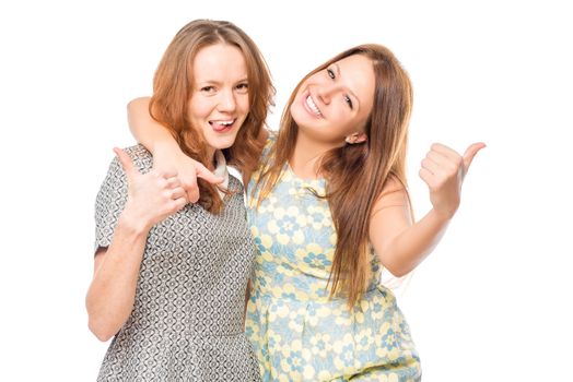 Portrait of cheerful friends embracing on a white background