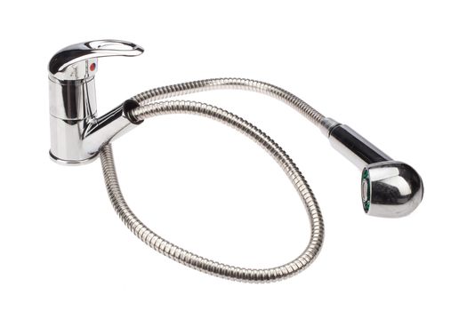 Metal chromium-plated water mixer on an isolated background