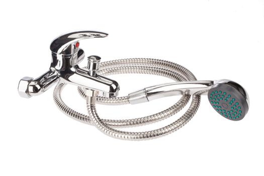 Metal chromium-plated water mixer on an isolated background