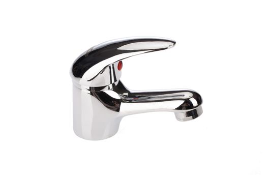 Metal chromium-plated water mixer on an isolated background