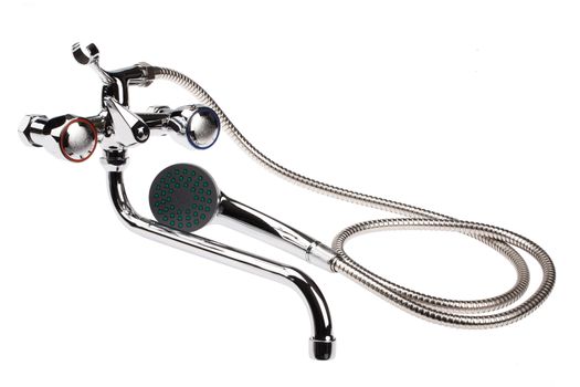 Metal chromium-plated water mixer on an isolated background