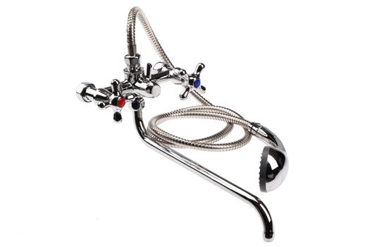 Metal chromium-plated water mixer on an isolated background