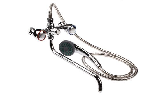 Metal chromium-plated water mixer on an isolated background