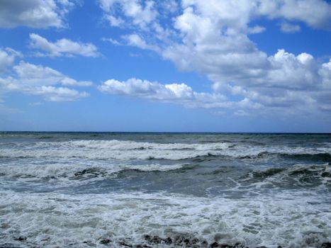 rough sea and the sandy beach of Tuscany, Italy