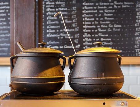 the cast iron pot is suitable to hold the heat on the food for long cooking