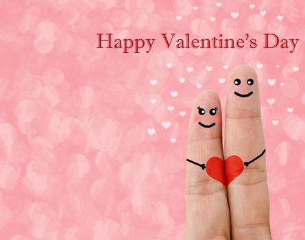 Painted finger smiley, Happy valentine's day concept on red background.