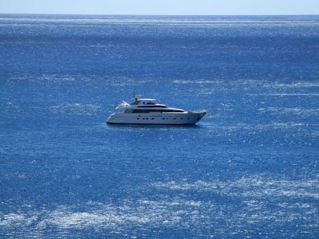 white yacht in the blue sea