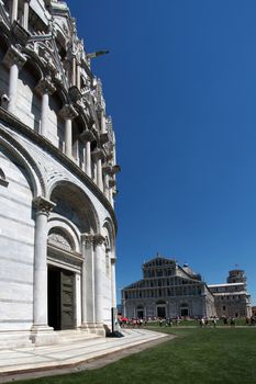 detail of the Pisa baptistery and the cathedral in the background, Tuscany, Italy