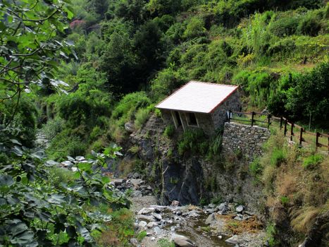 dilapidated house on the creek in Vernazza, 5 Terre Gulf, Liguria, Italy