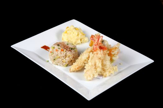 menu of fried fish with rice and mashed potatoes in white dish, on blac