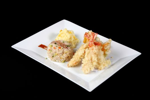 menu of fried fish with rice and mashed potatoes in white dish, on blac
