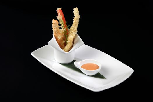 Japanese food, plate of fried fish with sauce