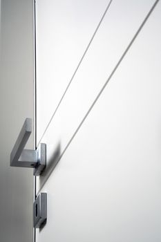 open white door on gray background