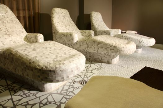 gym - room with heated stone loungers for relaxation