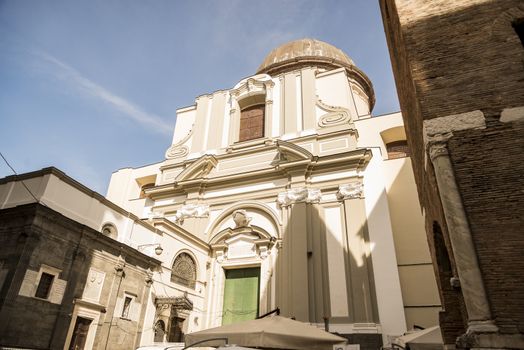 The Church of Santa Maria Maggiore with red-brick belfry is the oldest free-standing tower of its kind in the city, located on Piazza Miraglia in Naples, Italy