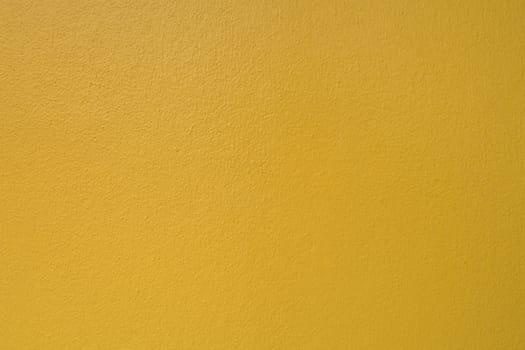 Yellow concrete wall as Texture Background