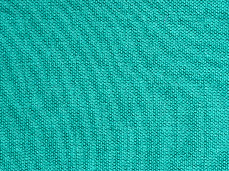 green knitted Jersey polo texture as textile background