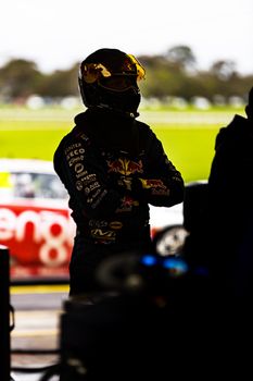 MELBOURNE/AUSTRALIA - SEPTEMBER 17, 2016: Red Bull Racing driver Alexande Premat waiting to take over from his team mate at the Wilson Security Sandown 500 'Retro' Endurance race at Sandown raceway.