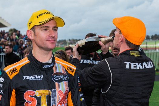 MELBOURNE/AUSTRALIA - SEPTEMBER 17, 2016: Team Darrell Lee STIX driver Will Davison after his podium finish at the Wilson Security Sandown 500 'Retro' Endurance race at Sandown raceway.