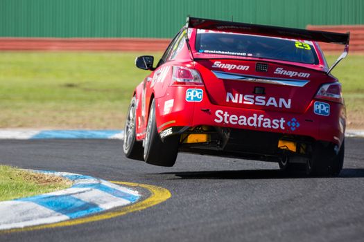 MELBOURNE/AUSTRALIA - SEPTEMBER 17, 2016: Nissan Motorsport driver Michael Caruso in qualifying session for the Sandown 500 'Retro' Endurance race at Sandown raceway.