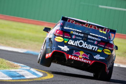 MELBOURNE/AUSTRALIA - SEPTEMBER 17, 2016: Supercars in qualifying session for the Sandown 500 'Retro' Endurance race at Sandown raceway.