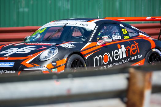 MELBOURNE/AUSTRALIA - SEPTEMBER 17, 2016: Movitnet/A.F.S. driver Tony Bates (24) in the Porsche Cup qualifying session for the Sandown 500 'Retro' Endurance race at Sandown raceway.