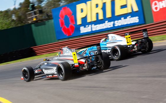 MELBOURNE/AUSTRALIA - SEPTEMBER 17, 2016: Formula 4 racecars in qualifying session for the Sandown 500 'Retro' Endurance race at Sandown raceway.